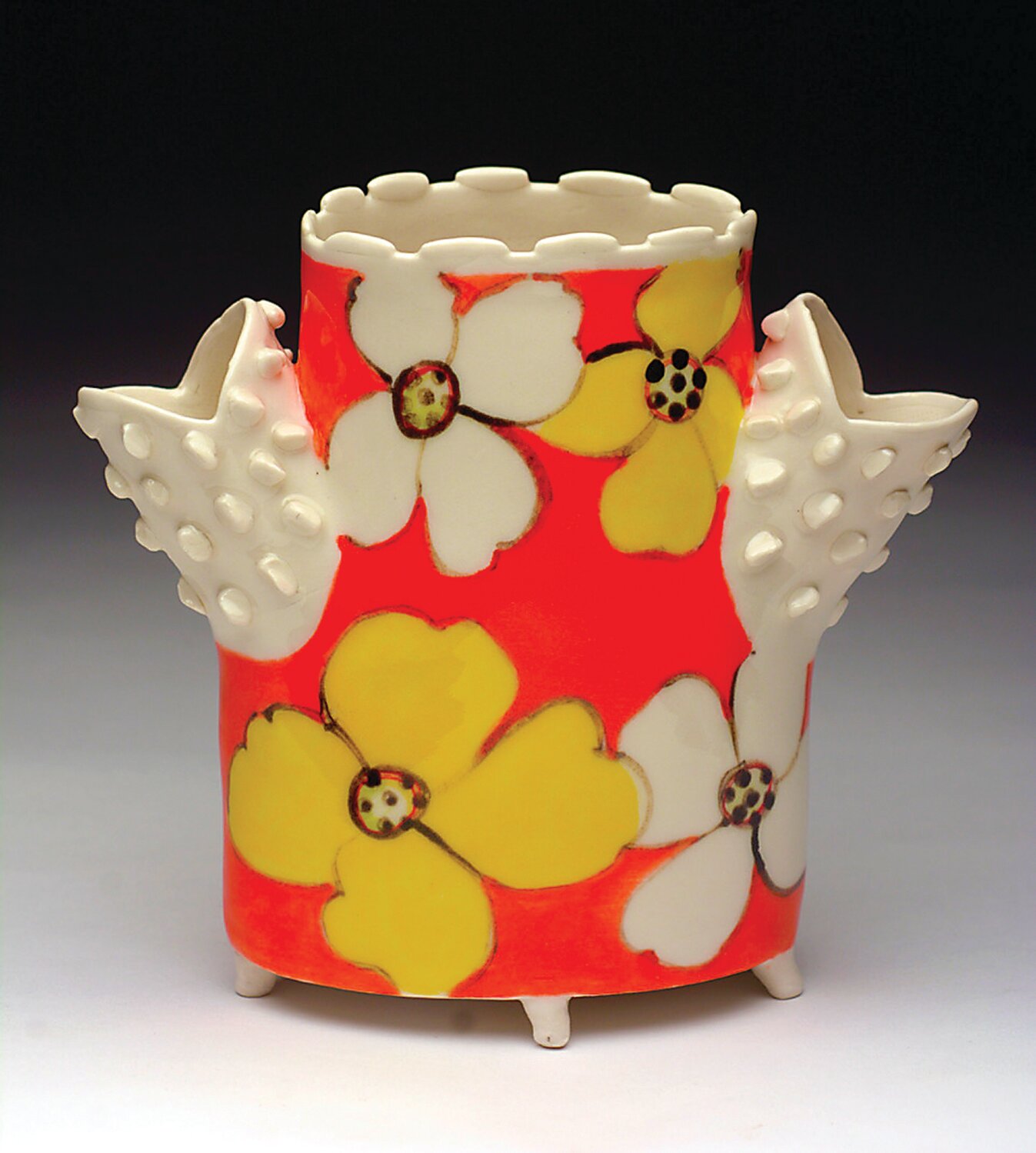 Jerry Bennett created this floral vessel in papers clay.