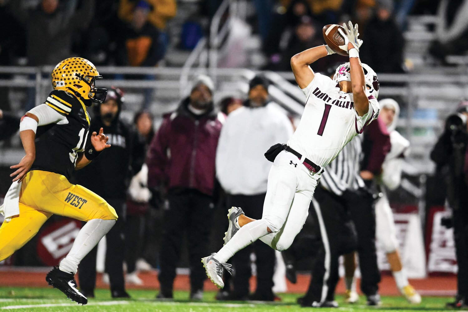 Garnet Valley’s Kai Lopez makes a leaping catch just past Central Bucks West’s Cooper Taylor setting up the second touchdown, making the score 14-7 in the third quarter.
