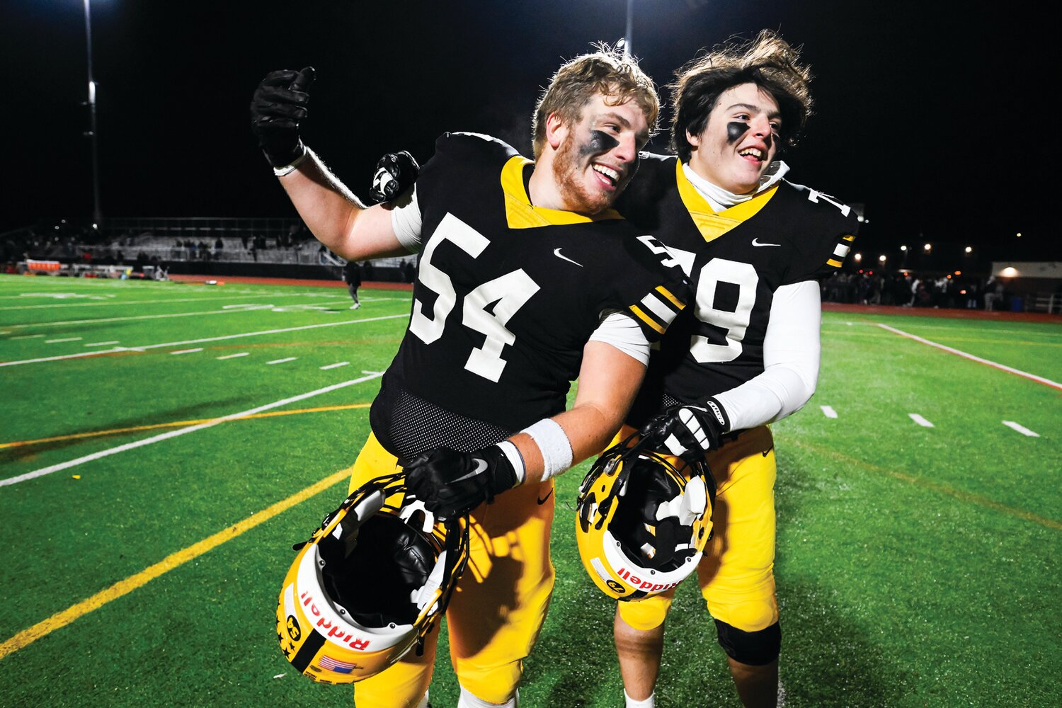 Central Bucks West’s Hayden Mulligan and Chago Bustelo run off the field after the overtime victory.