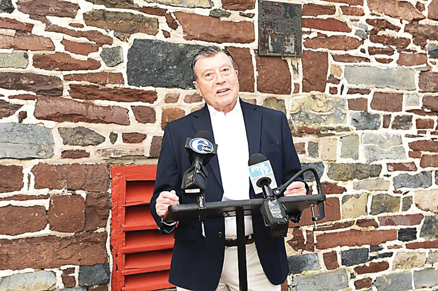 Bill Nolan, a longtime friend of Bill Harris and Jay Manas, for whom the Playhouse barn is named, speaks at the rededication ceremony.