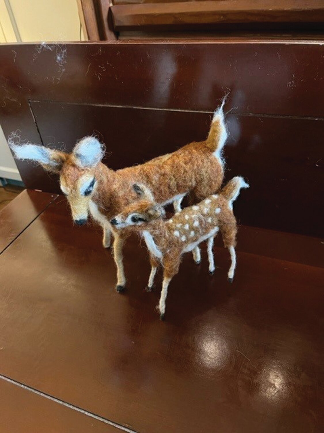 Doe and fawn, definitely Pennsylvania whitetail deer, are among Gerry Mulloy’s menagerie of knitted animals.