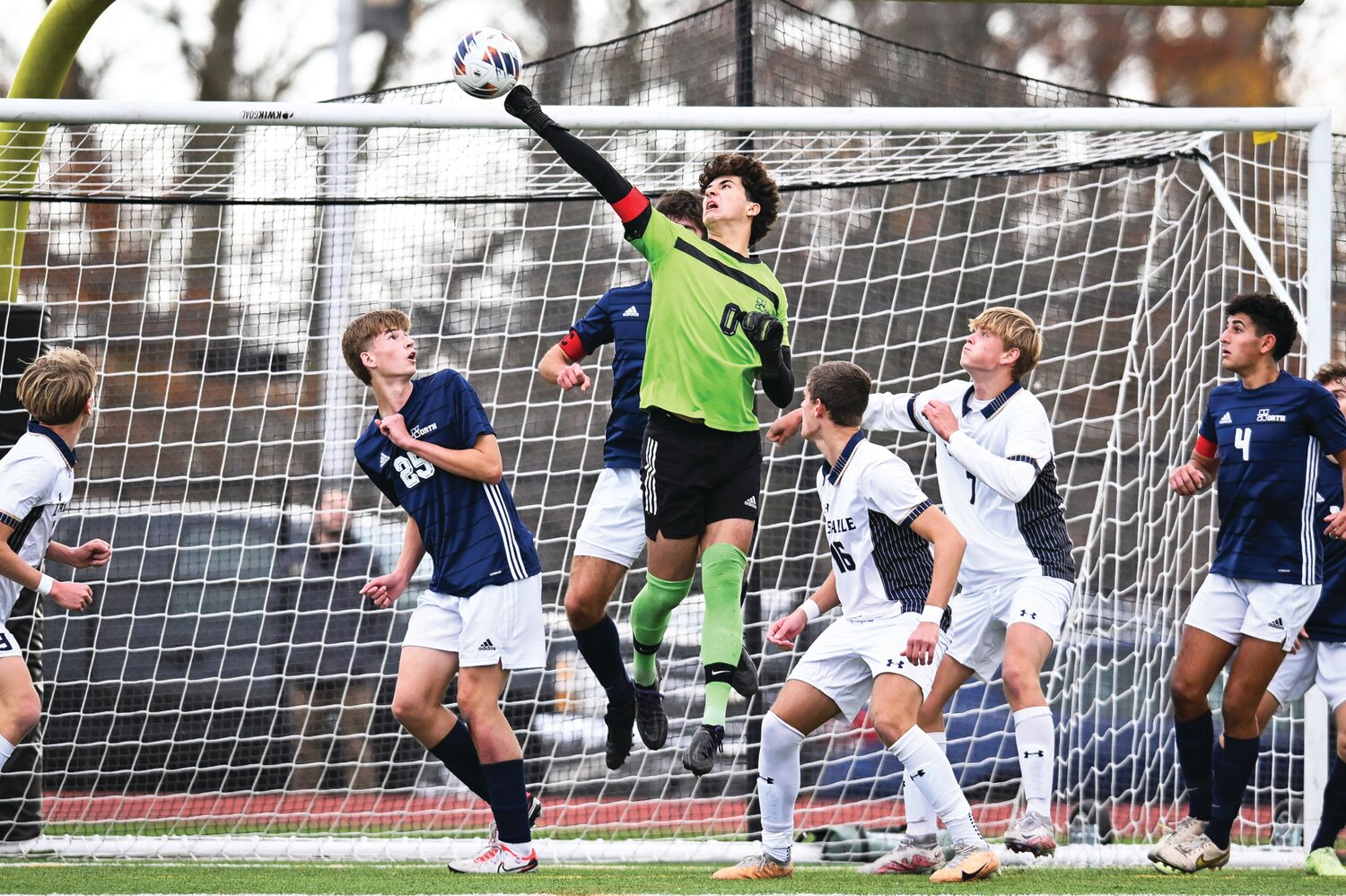 Council Rock North goalie Calvin Hopkins punches a corner kick away to make a save during the first half of Saturday’s PIAA quarterfinal game.