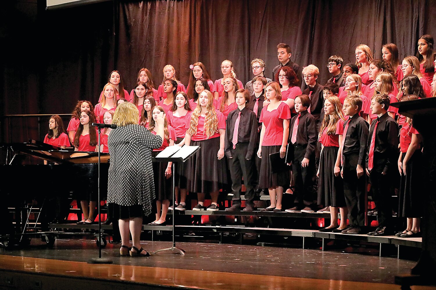The Lenape Middle School Select Choir is led by choir director and OHMTEC board member Jaime Rogers.