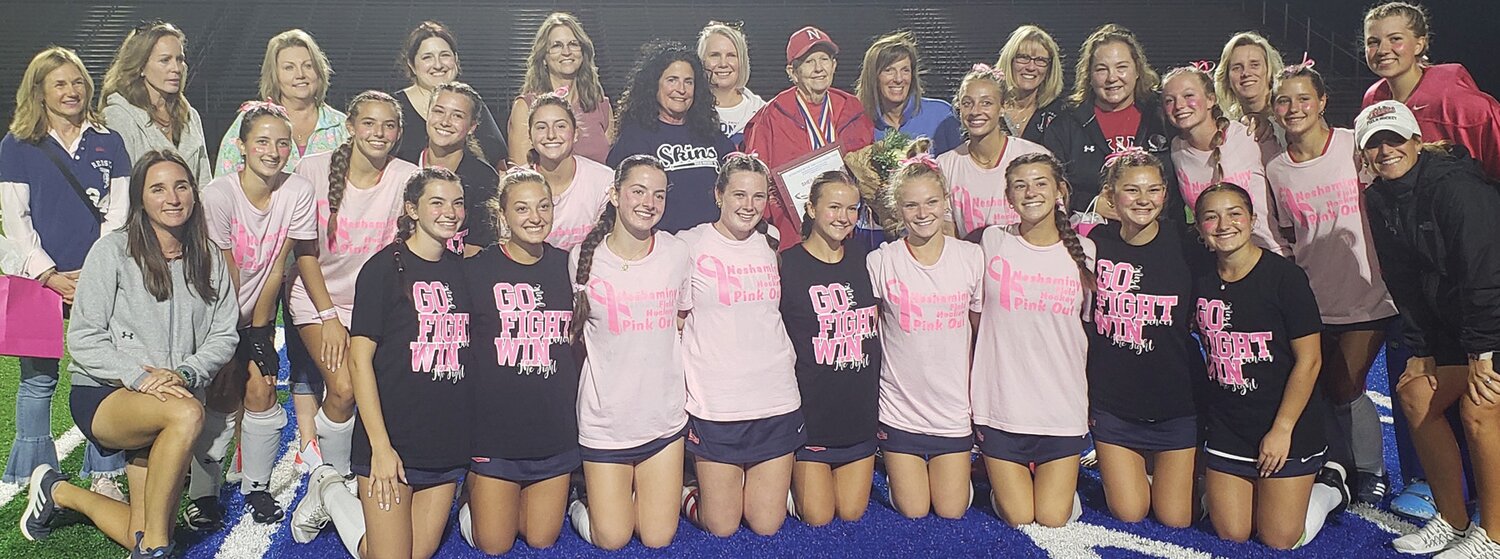 Neshaminy field hockey players, from the 1983 state champion team and 2023, pose for a photo.