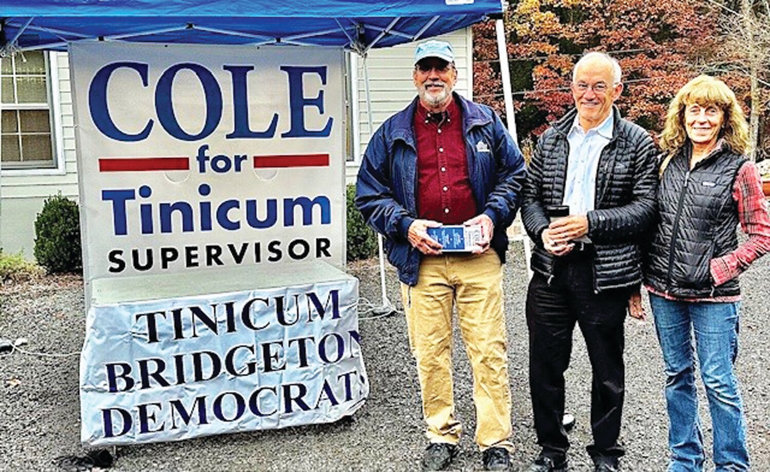 Tinicum supervisor-elect John Cole stands with supporters John Blake and Darlene Wright Blake near the polling station at the Tinicum Township Municipal Building on Election Day.