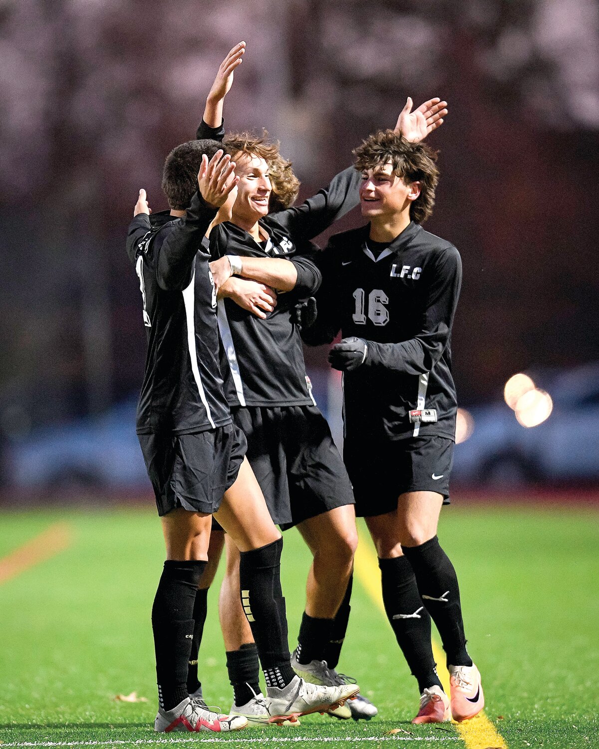 Faith Christian’s Guilherme Machado celebrates his second goal of the game, putting Faith up 3-1 at the time.