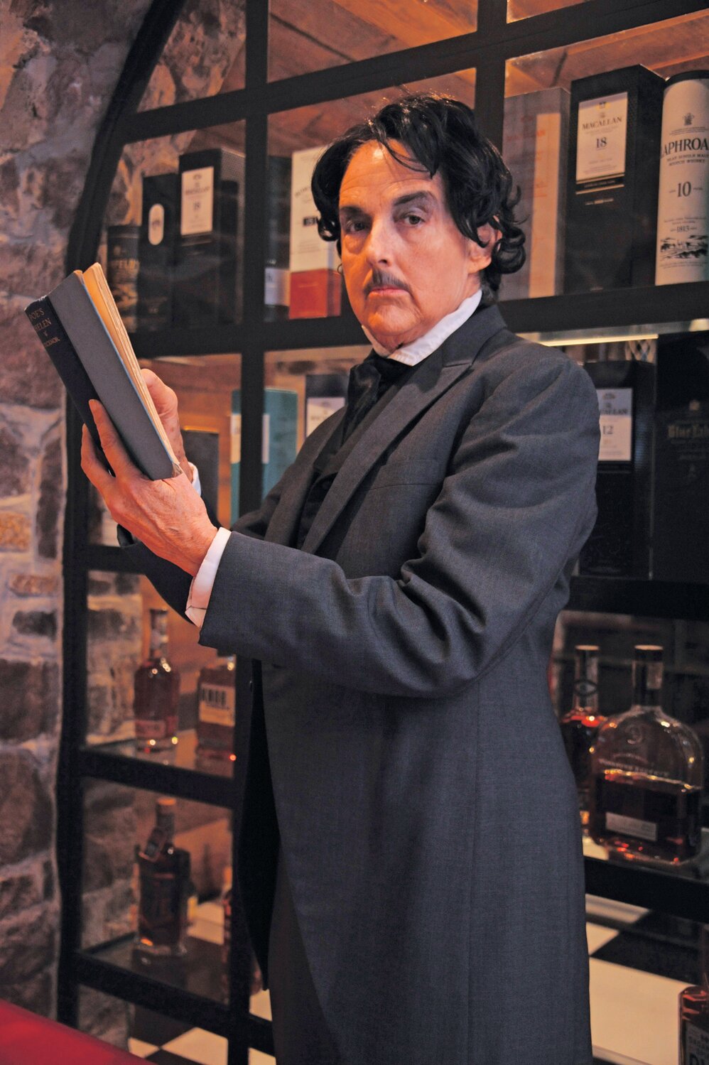 Edgar Allen Poe, portrayed by Helen McKenna.