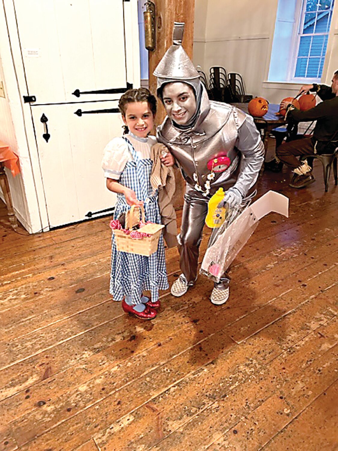 Nora and Lizzie Kelly dressed as Dorothy and the Tinman.
