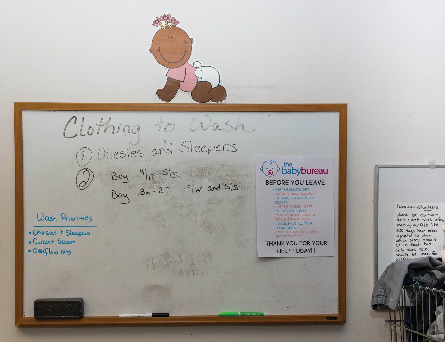 A whiteboard lays out the priorities for volunteers on a particular day in October.