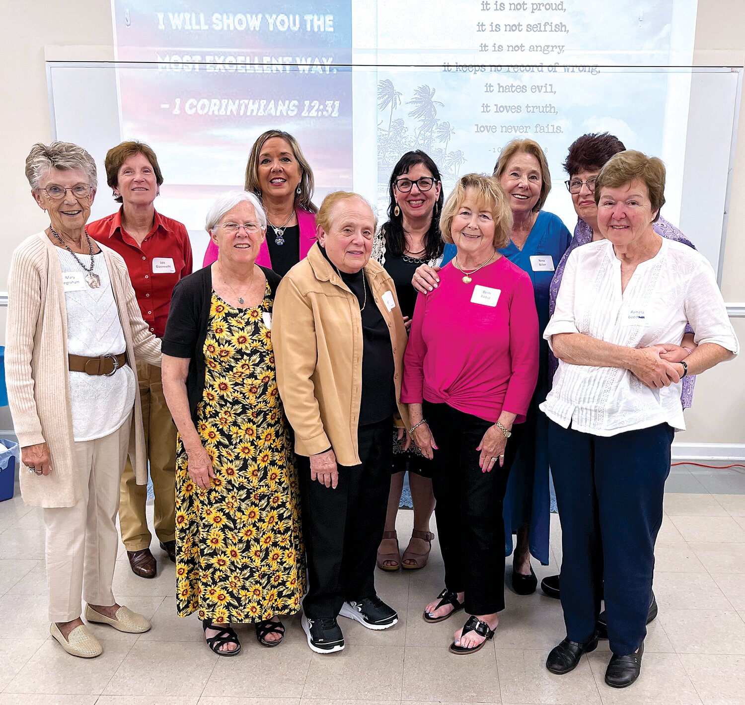 Day of Reflection speaker Marie Joseph, back row, pink jacket, talked Sept. 19, with the Ladies of Mt. Carmel about "Big Faith in a Little Way," inspired by St. Therese the Little Flower.