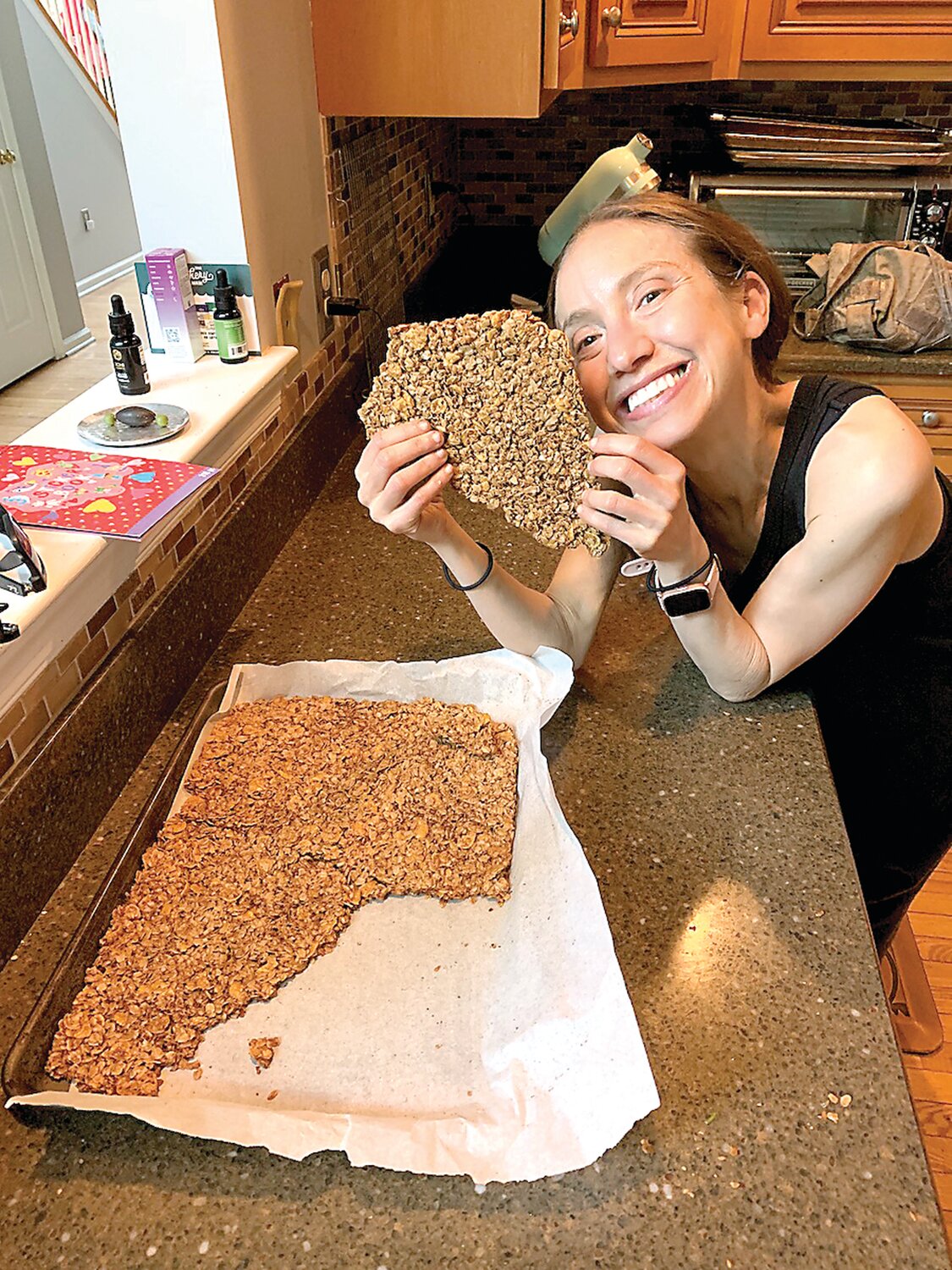 Rochelle Berg displays some of her fleshly made Living Smart Granola.