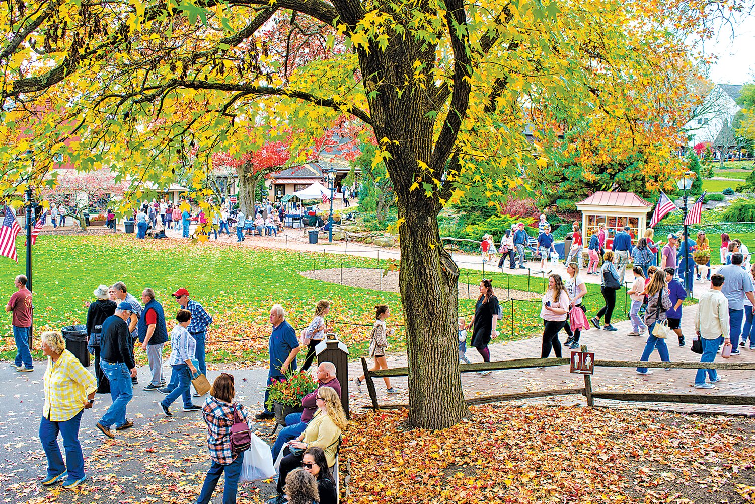 Visitors enjoy a previous Apple Festival and fall colors at Peddler’s Village.