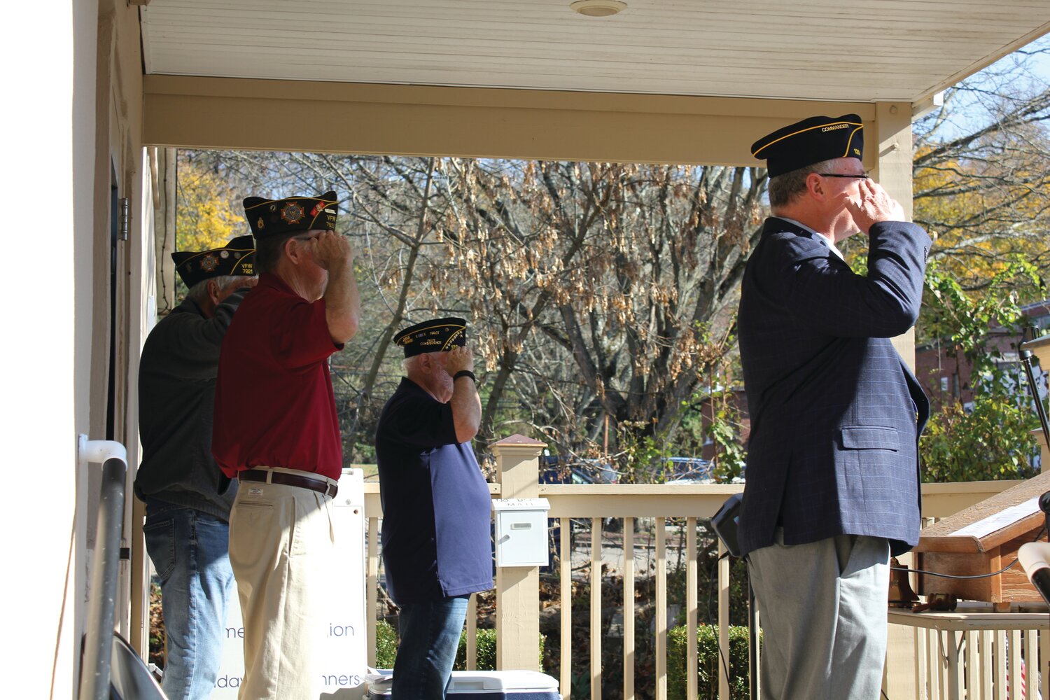 John Colna, chaplin; Georg Hambach, VFW 7921 commander; Norb Rosso, American Legion past commander; and Bob Miller, American Legion Post 120 commander, salute the flag at the Veterans Day ceremony in Lambertville, N.J.