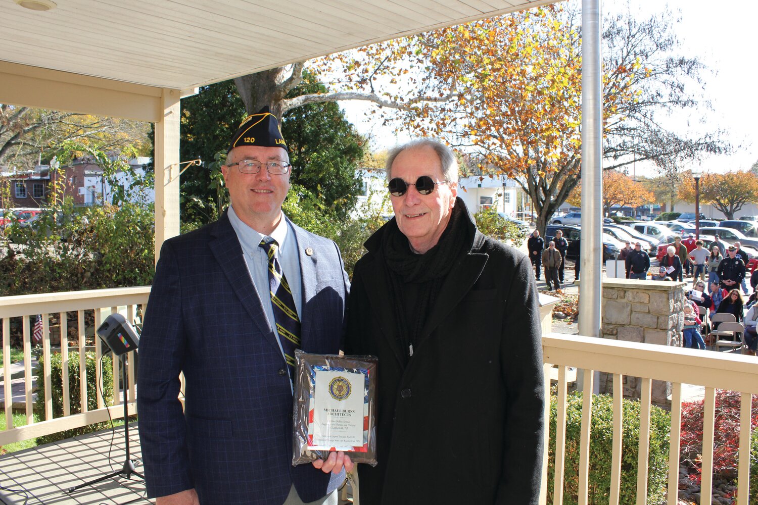 American Legion Post 120 Commander Robert Miller and Michael Burns of Michael Burns Architects, who was recognized as a Community Center of Influence person for 2023 for his contributions to the veterans of the community.