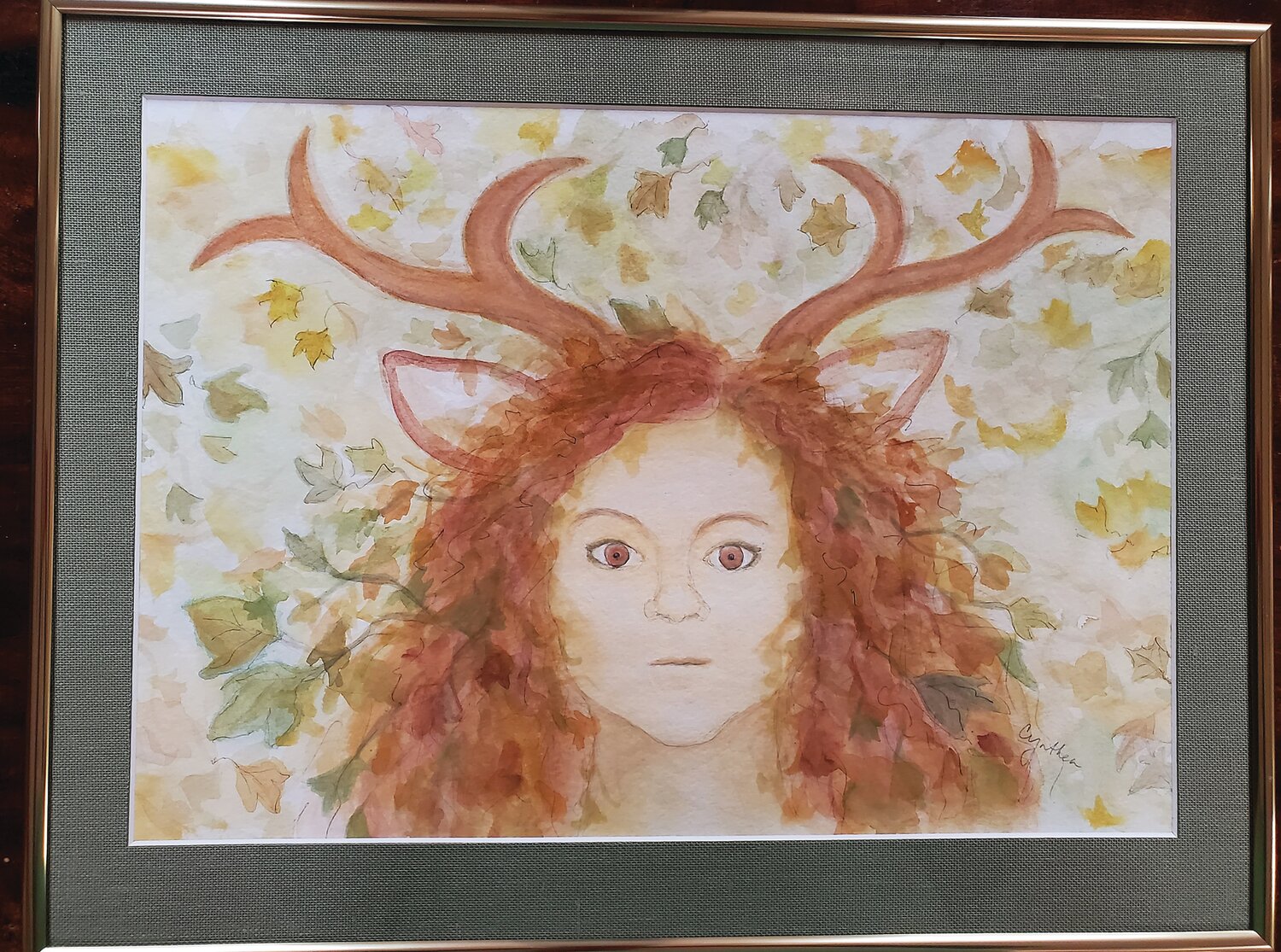 “Deer Girl/Spirit of Autumn” is a watercolor on paper by Cynthia Greb.