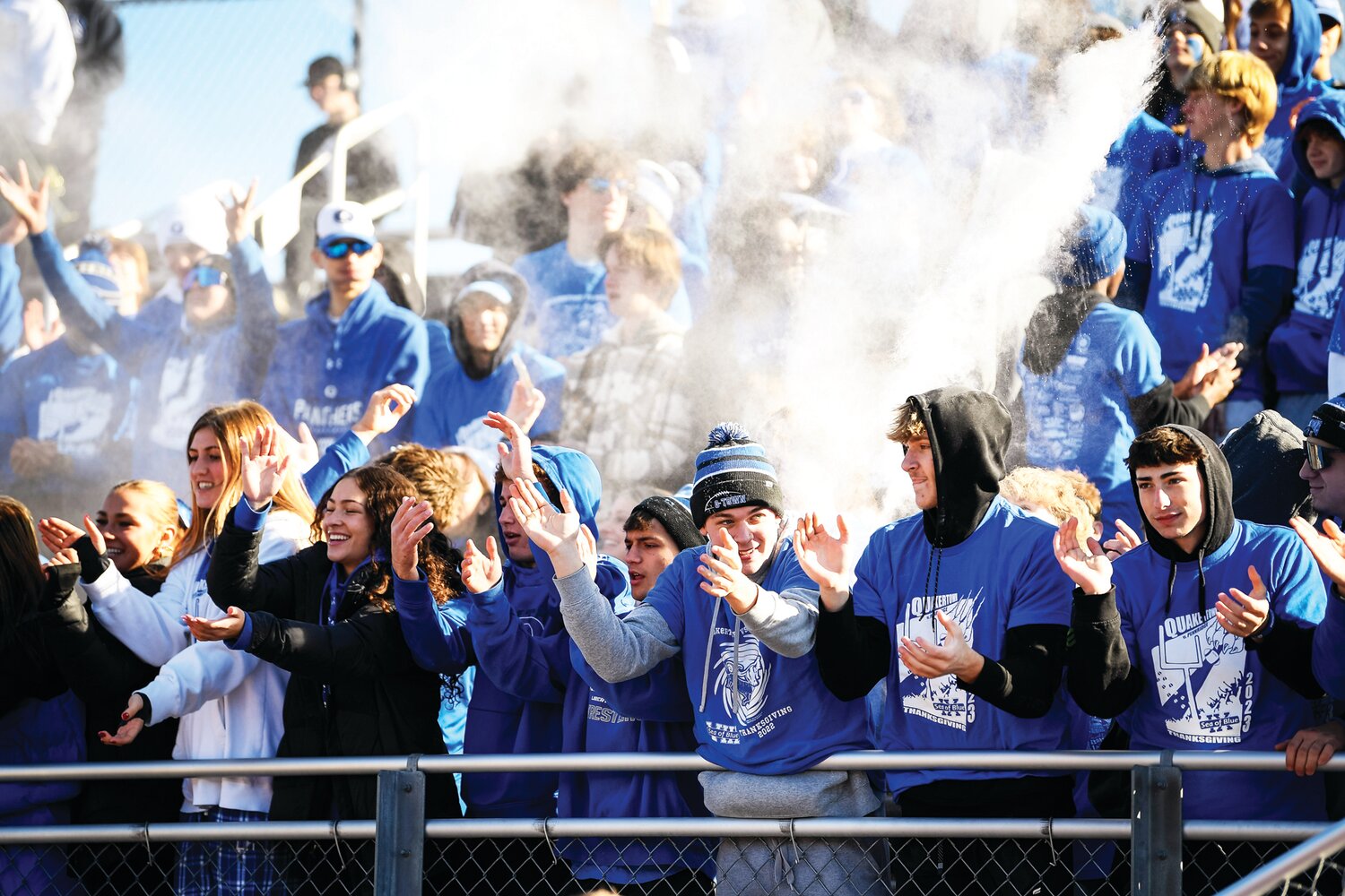 The Quakertown student section sprays baby powder after a 40-yard field goal by Quakertown kicker Logan Jeffery.