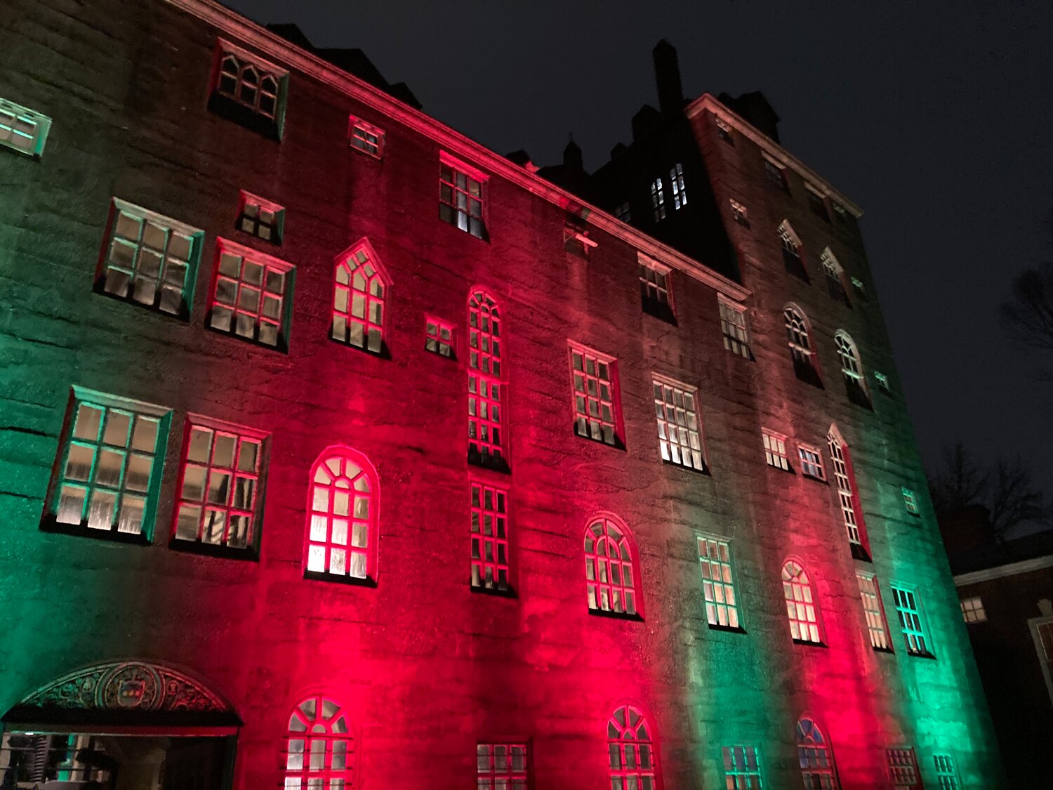 The Mercer Museum is bathed in red and green lights for the Mercer Museum Holiday Open House.