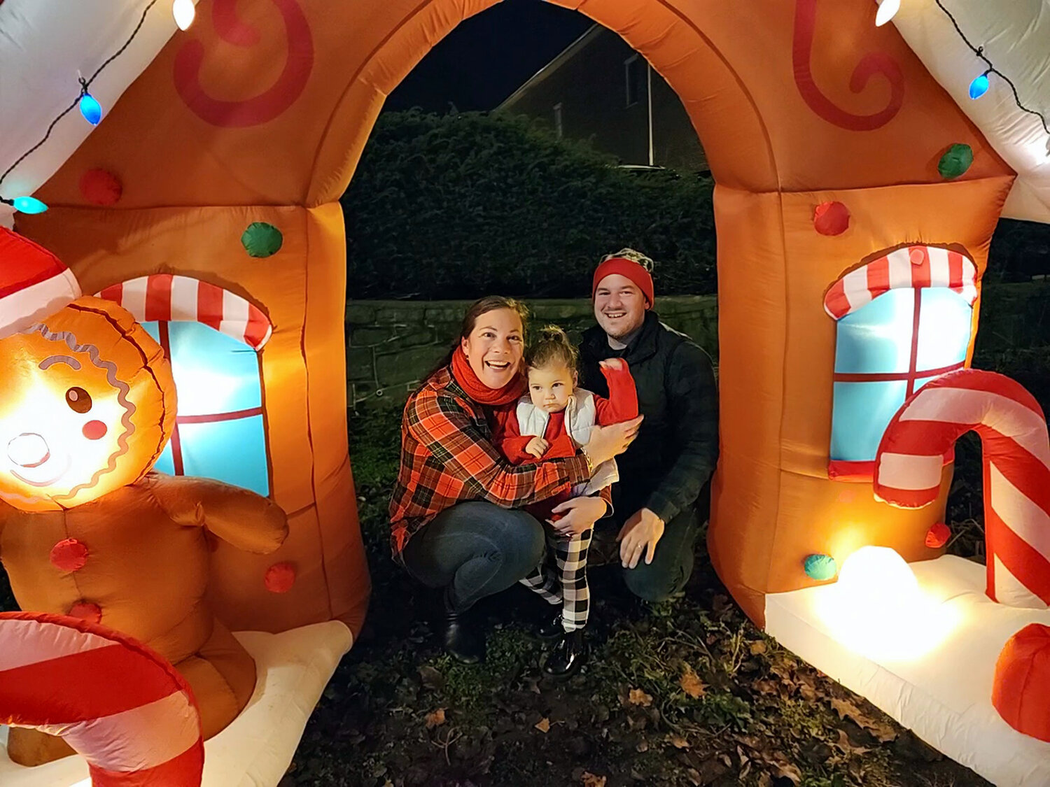 Gwen, Steve and Martha Bobeck, of Sellersville explore a festive inflatable at Saturday’s Perkasie Tree-Lighting Ceremony.