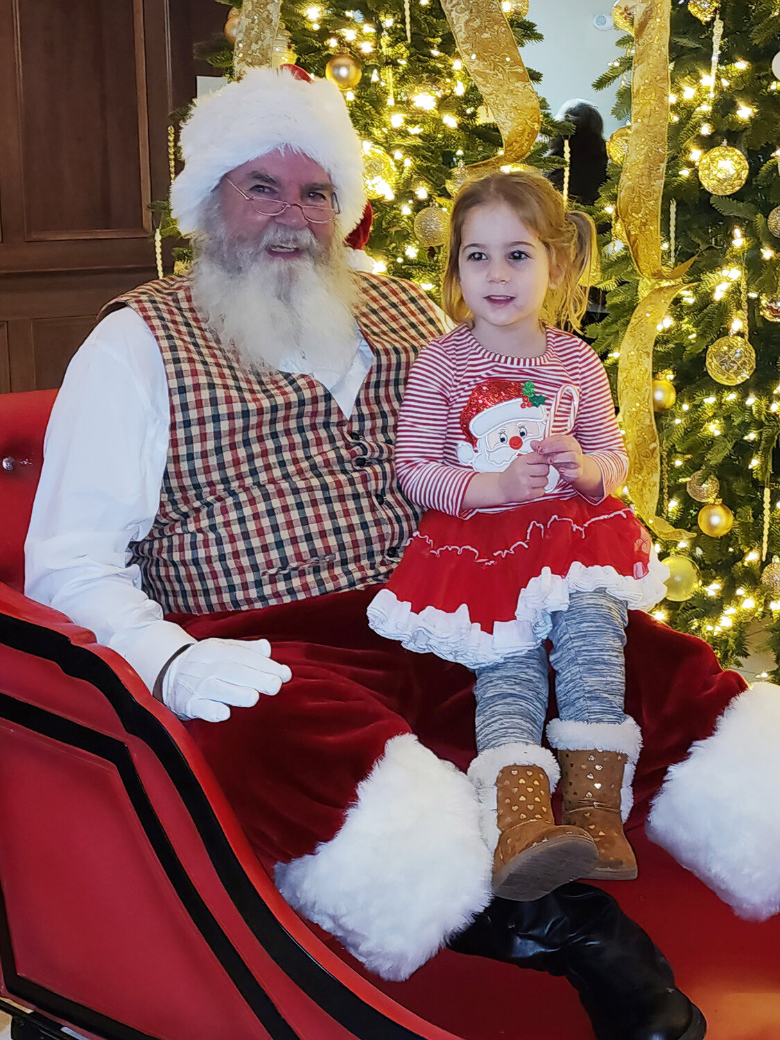 Ella Pfeiffenberger of Harleysville, poses with Santa.