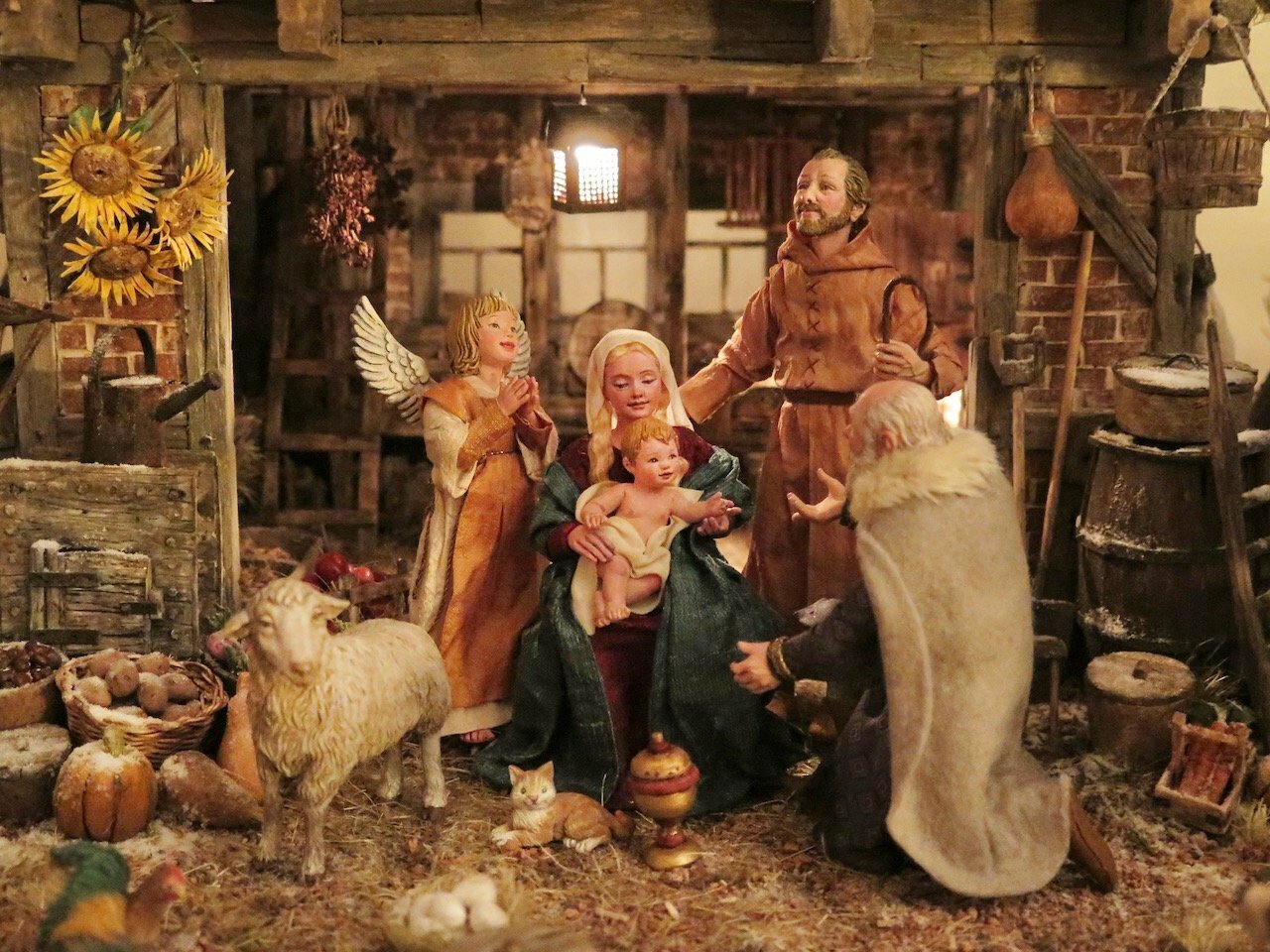 This Flemish Nativity scene, created by New Jersey artists R. Michael Palan and Karen Loccisano, reflects the style of the Flemish artist Pieter Bruegel from the 16th century.