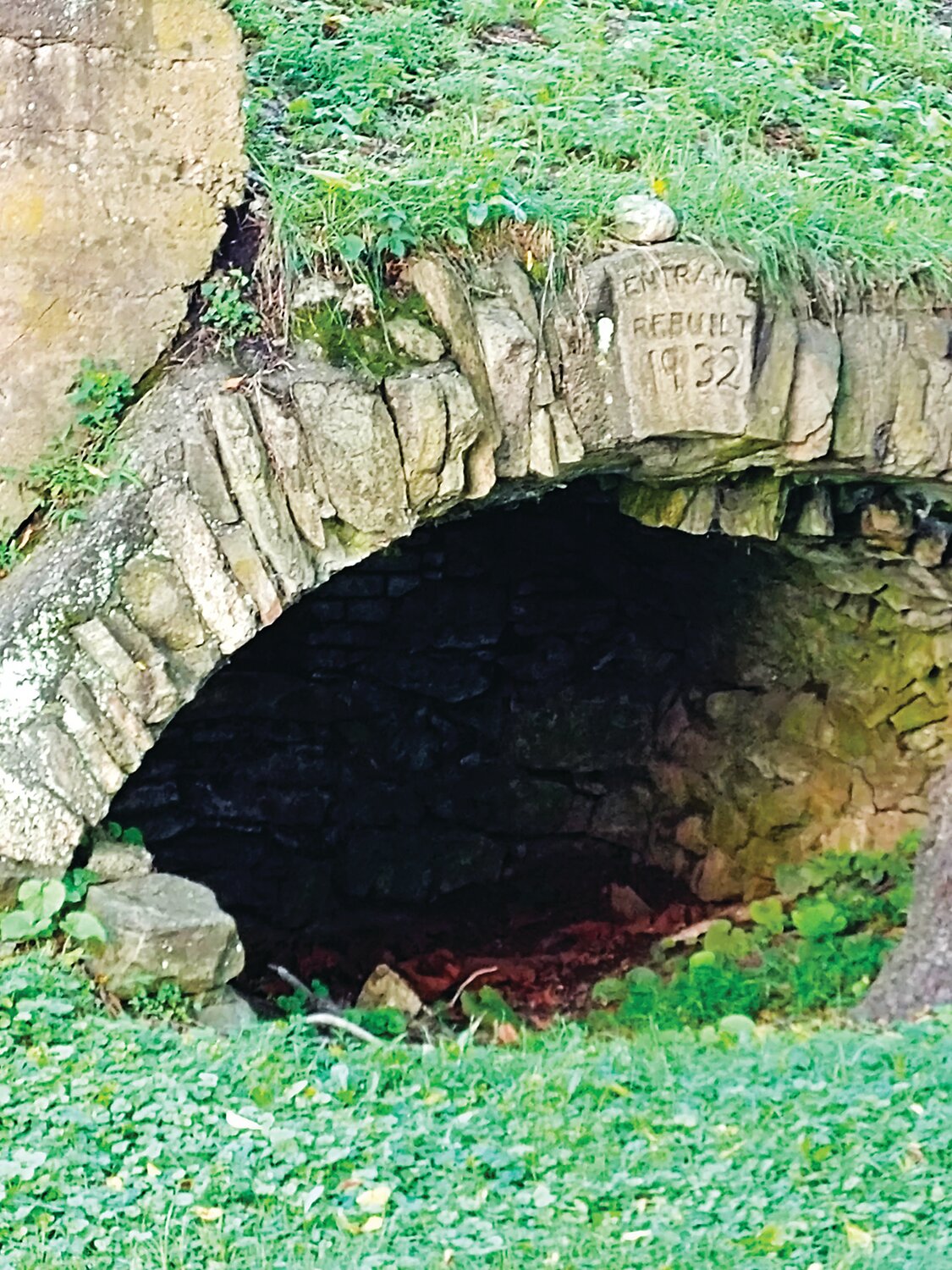 Stone archway marks the entrance to the original 1727 Durham Furnace on the banks of Cooks Creek.