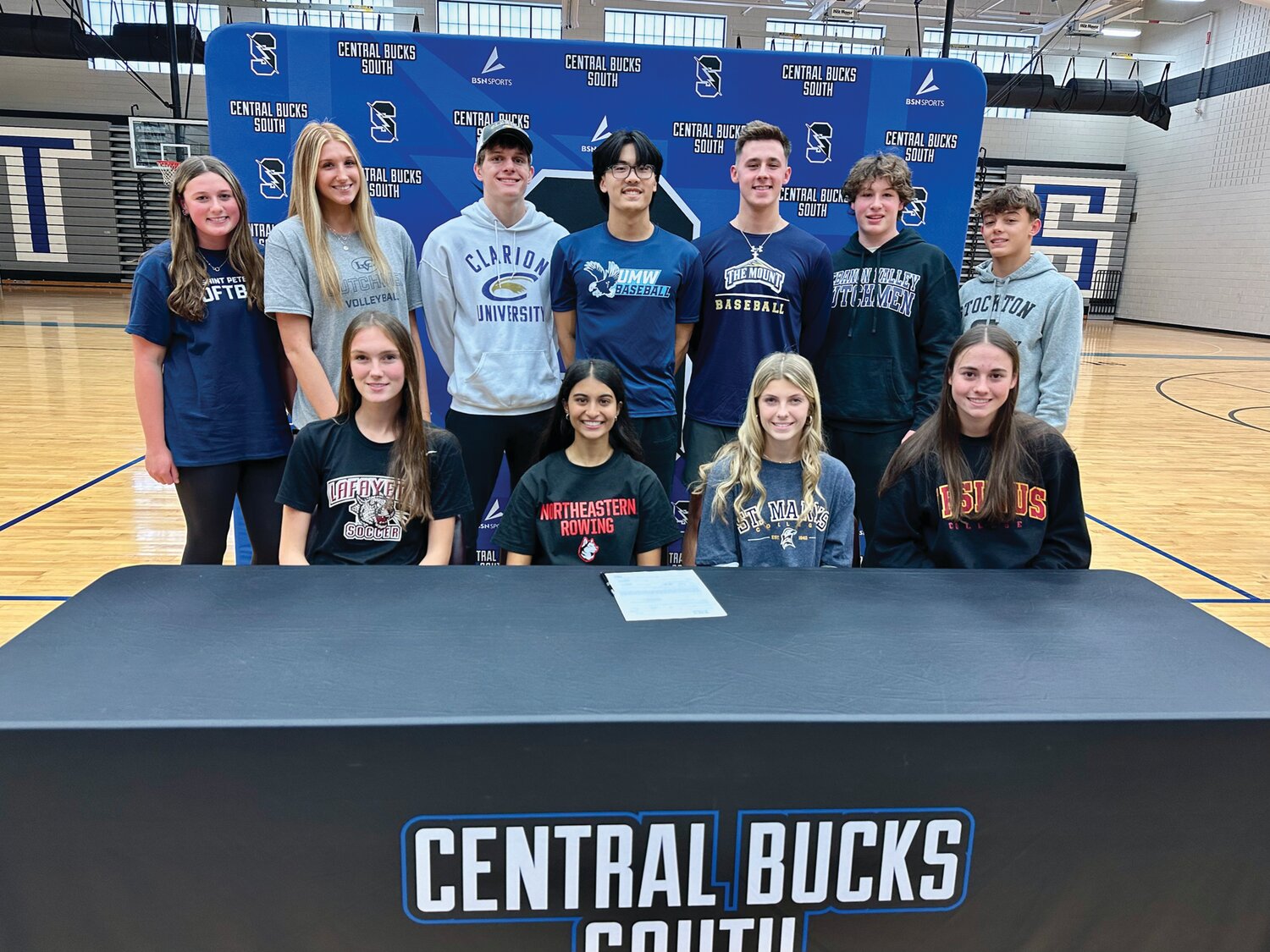 Central Bucks South recently recognized 11 seniors for their commitment to compete in collegiate sports. From left are: front row, Brooke Commins, Saara Sheth, Brooke Hall, Bella Smouse; back row, Steph Bendzlowicz, Jillian Jefferys, Richard Scholer, Michael Liu, Braeden Black, Dominic Varacallo and Keith Conner.
