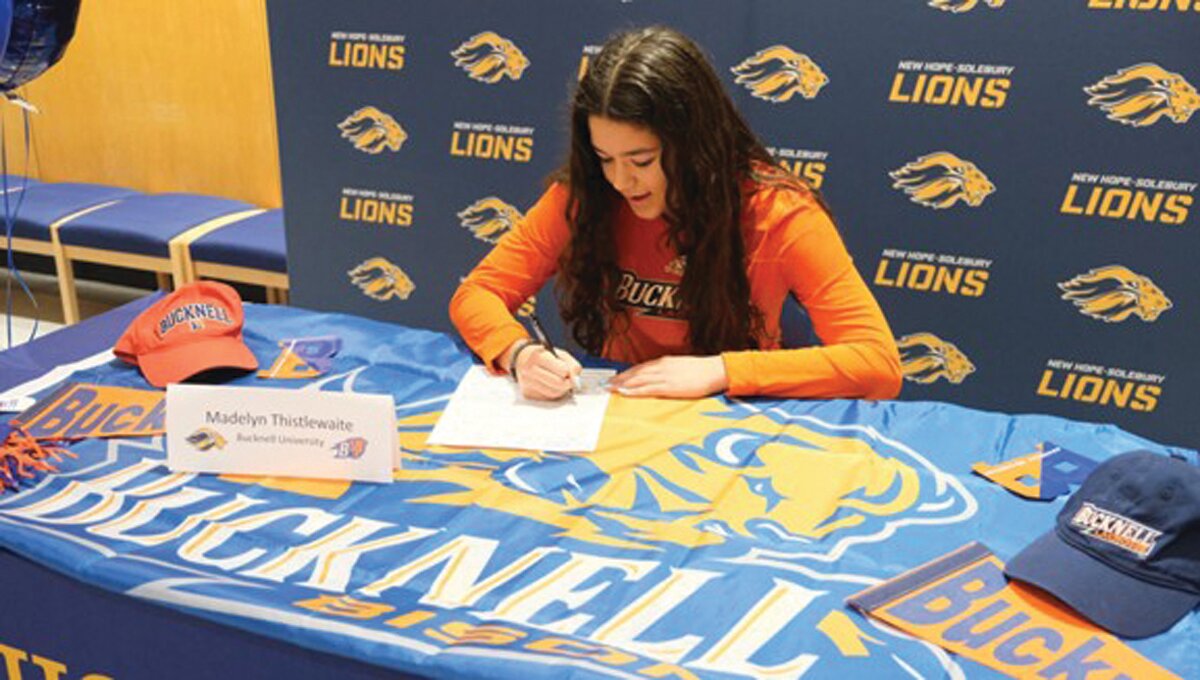 Courtesy of New Hope-Solebury School District
Madelyn Thistlewaite signs her letter of intent to play at Bucknell University.