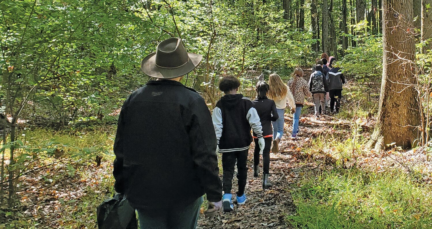 Keystone Elementary School students take a “mindfulness walk” in Croydon Woods.