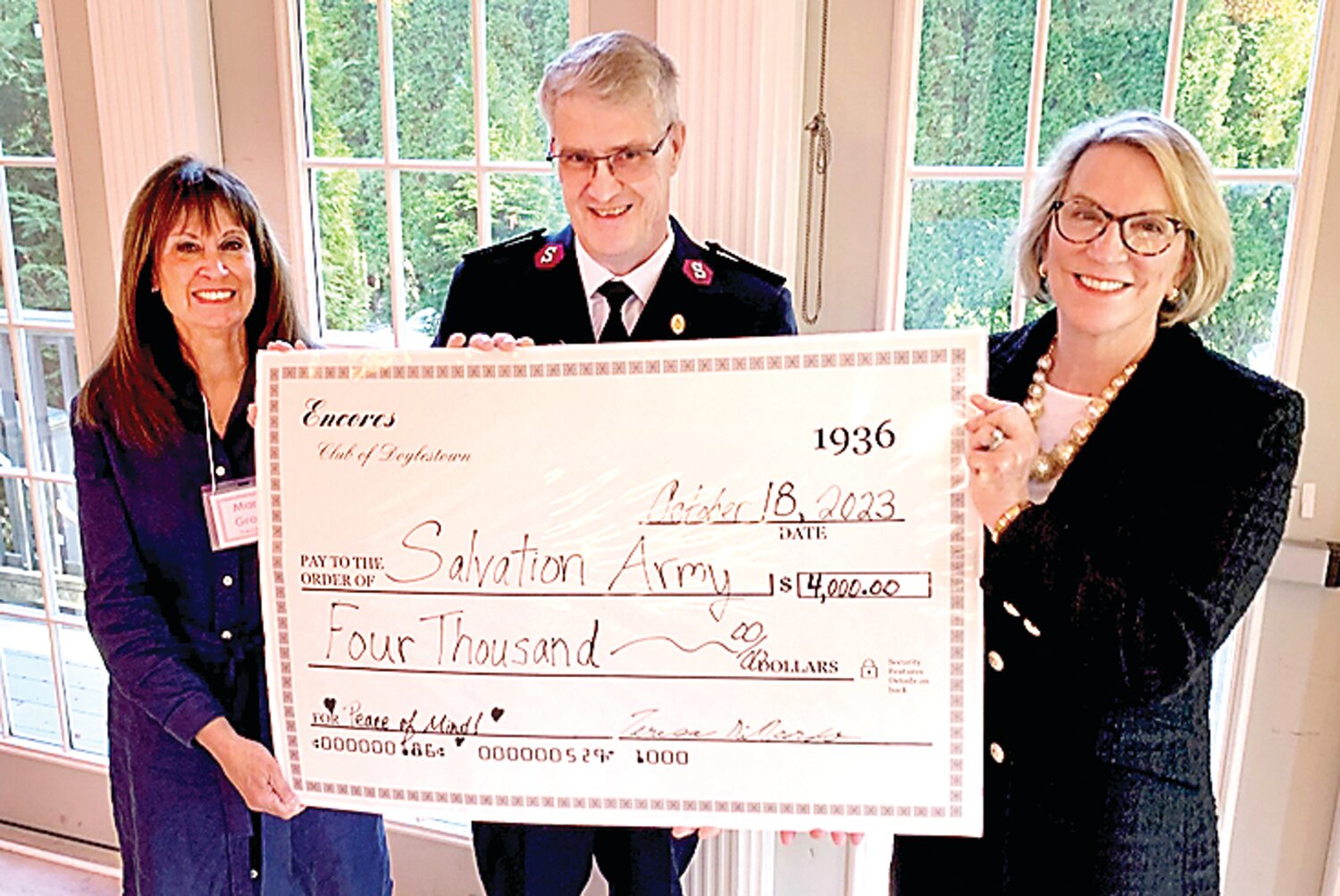 From left are: Mary Gross, Encores of Doylestown president; Major Duane Harris of the Salvation Army Levittown Corps and Beth Reynolds of Encore of Doylestown’s Ways and Means Committee.