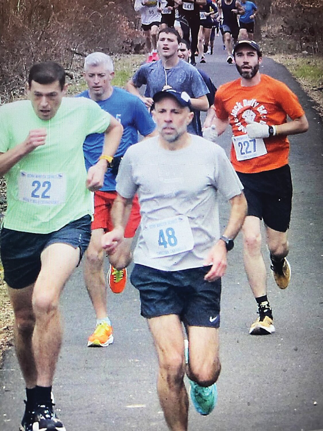 Chris Carabello (No. 48) finished sixth overall in Sunday’s Covered Bridge 5K at Tyler State Park.