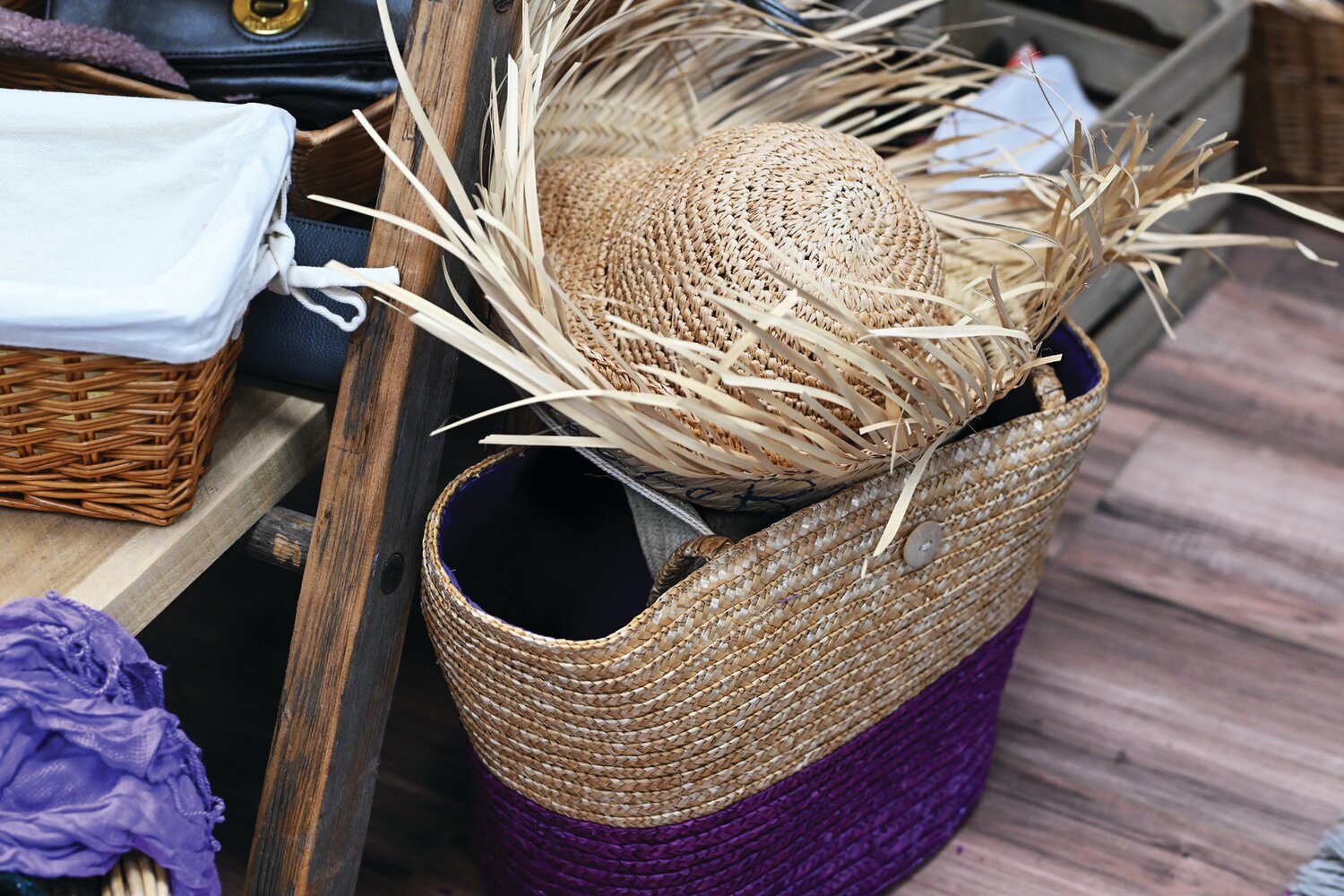 This straw hat and bag are among the unique items that can be found at Worthwhile Wear.