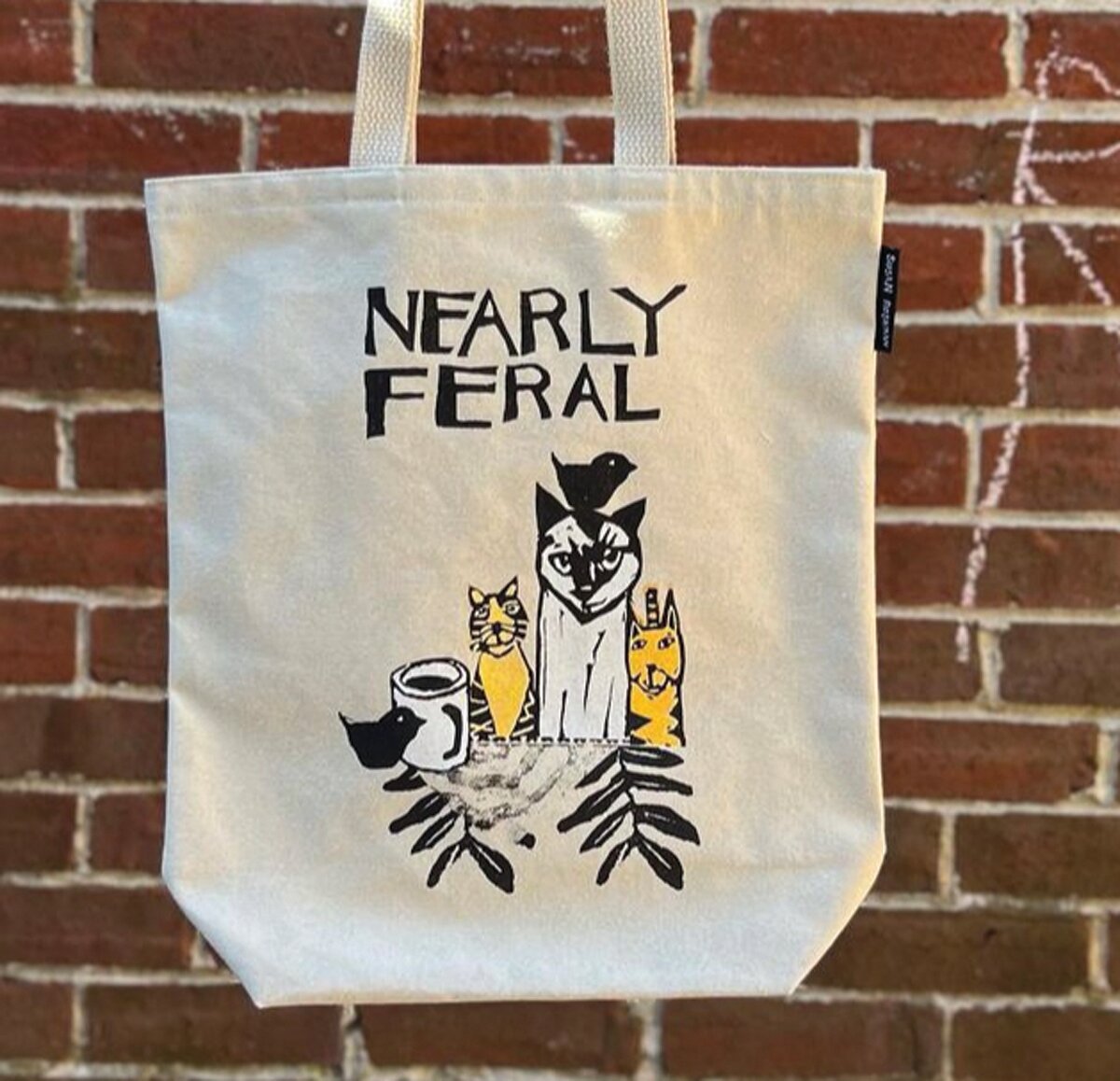 Nearly Feral by Susan Roseman on an Eric and Christopher tote.