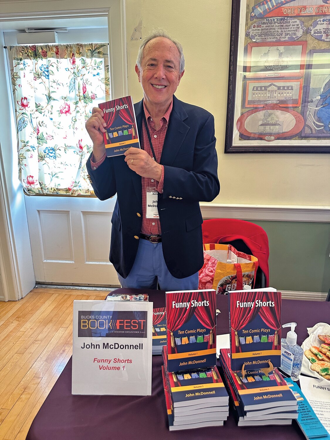 John McDonnell displays his book, “Funny Shorts,” at the Bucks County BookFest.