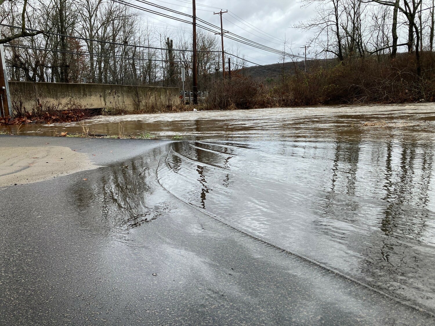 Lahaska Creek rushes under Route 413 on Monday afternoon.