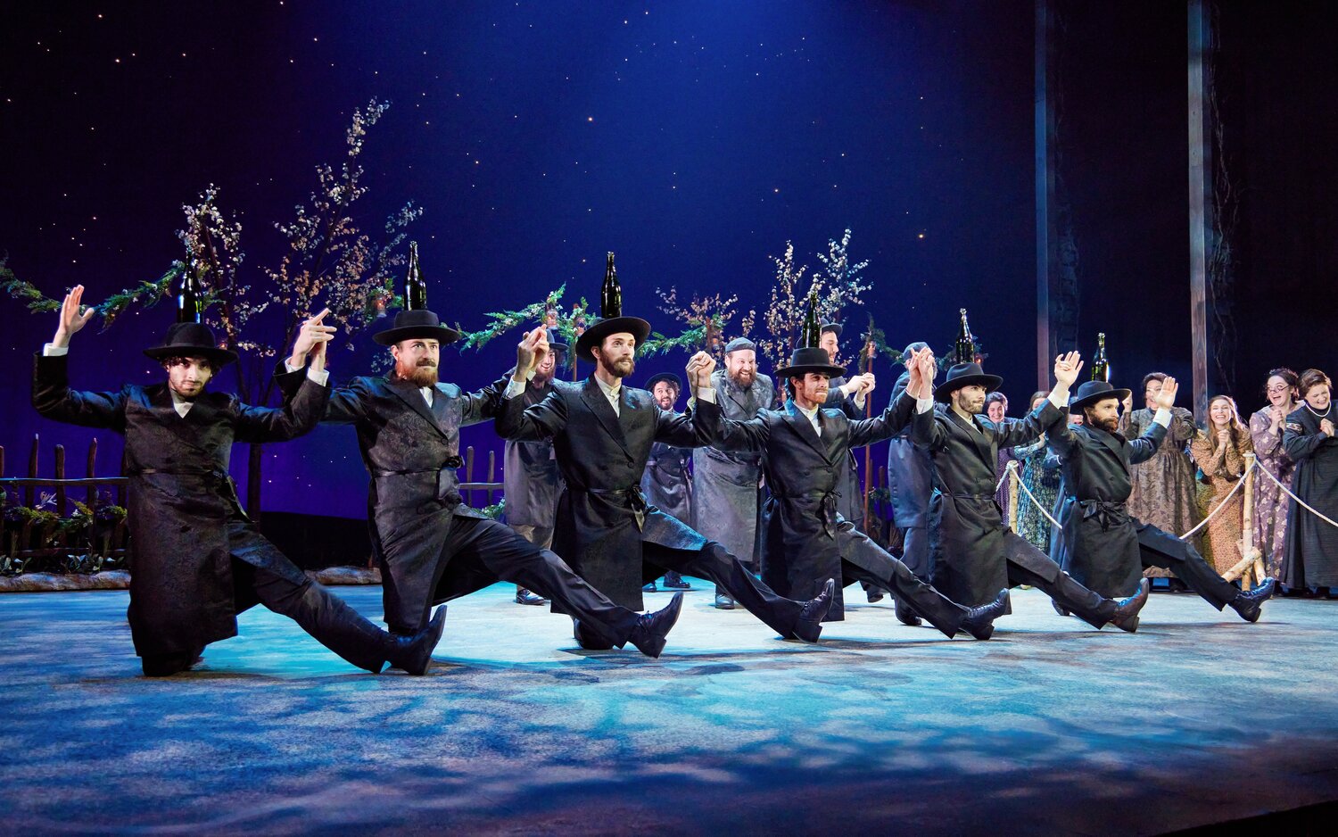 The company performs the Bottle Dance in Paper Mill Playhouse’s “Fiddler on the Roof,” directed by Mark S. Hoebee.