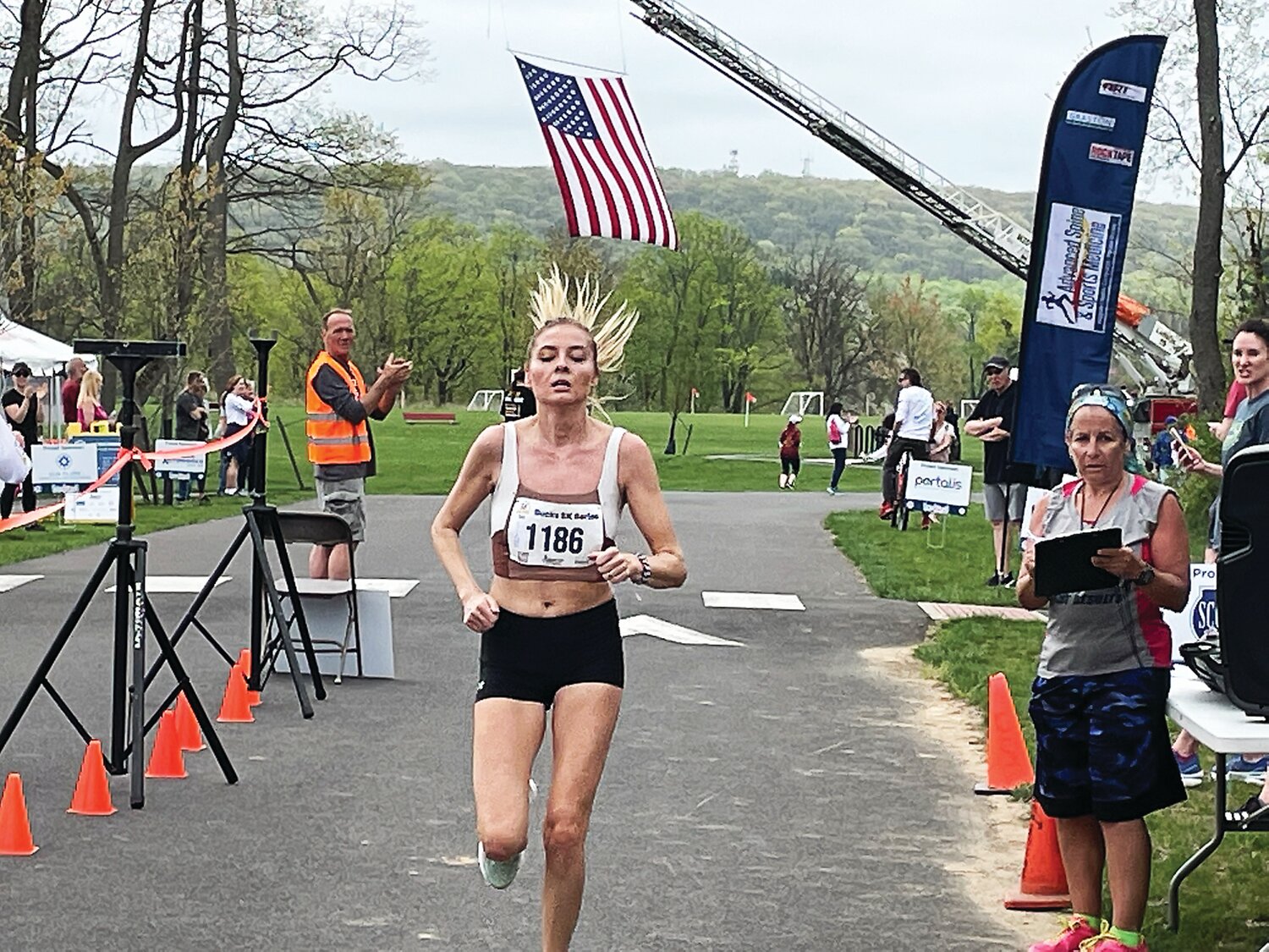 Hannah Borish captures the women’s title in the 2023 Be Kind 5K, part of the Bucks 5K Series.
