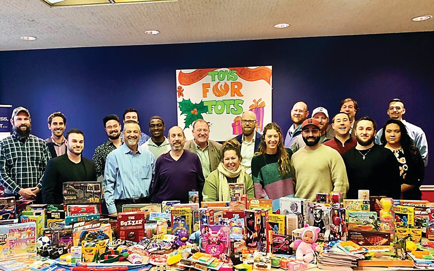 The Quakertown-based Higgins Division of USHEALTH Advisors, a UnitedHealth Care Company, recently helped donate about 350 toys to Toys for Tots through the Central Bucks Regional Police Department and the U.S. Marine Corps Reserves.