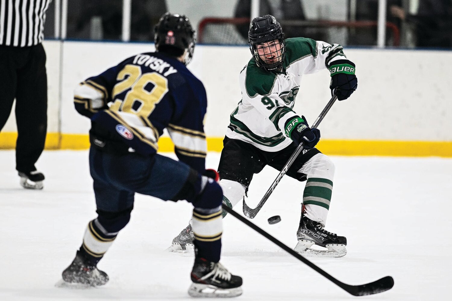 Pennridge’s Nicholas Young gets off a shot as Council Rock South’s Chase Tovsky closes in during the third period.