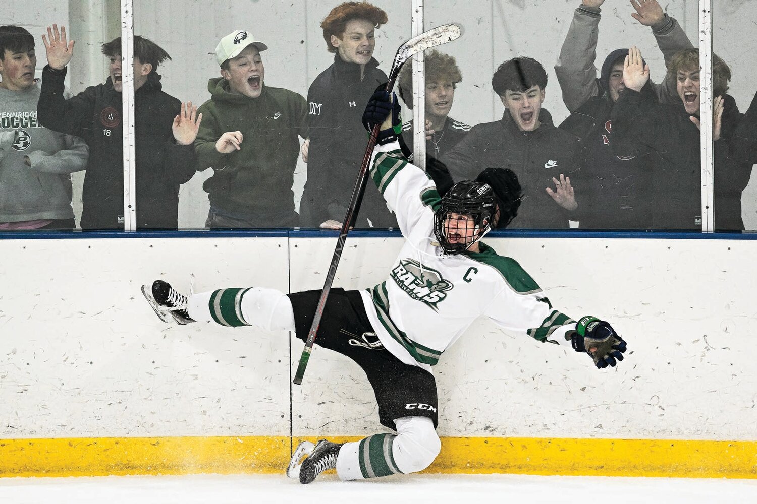 Pennridge captain Colin Dachowski slides into the boards after tying the game at 1-1 in the first period.