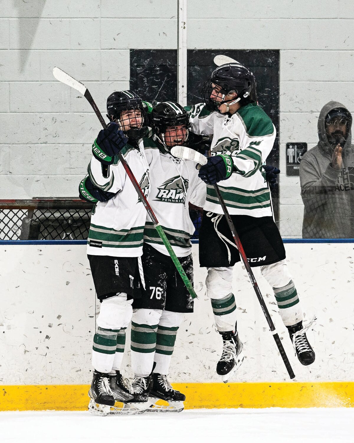 Pennridge players celebrate Shane Dachowski’s second period goal, putting the Rams up 3-1 at the 9:00 mark.
