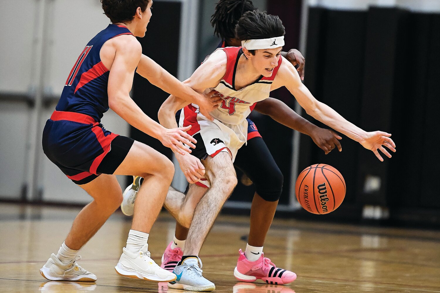 Plumstead Christian’s Jordan Eade loses control of the ball after getting double teamed by Jenkintown’s Mason Steuber and Desmond Trail.