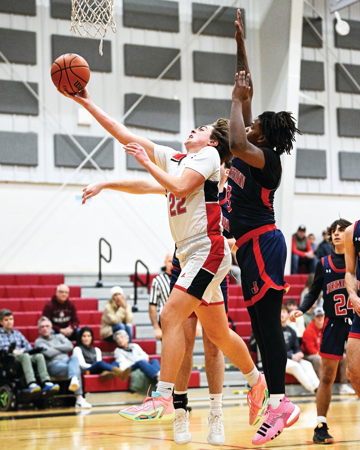 Plumstead Christian’s Tobias Link drives past Jenkintown’s Desmond Trail.