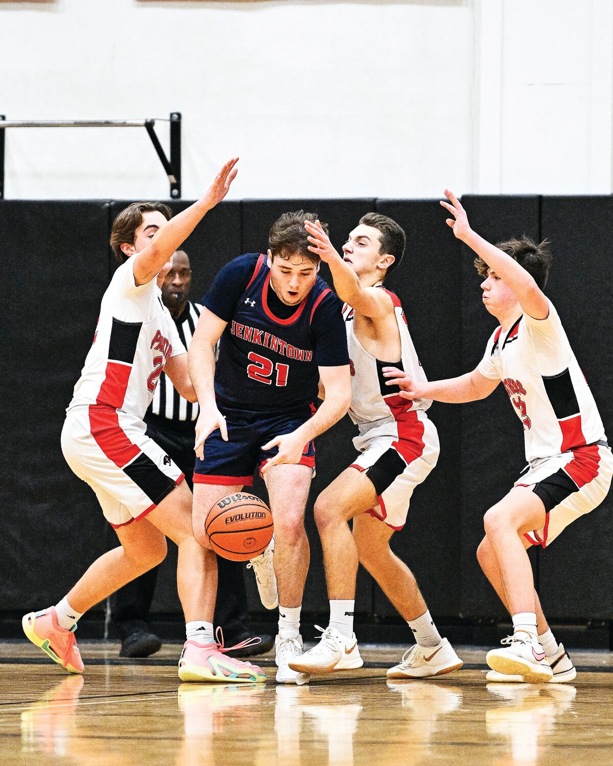 The Plumstead Christian defense surrounds Jenkintown’s Tommy Walsh during the first half.