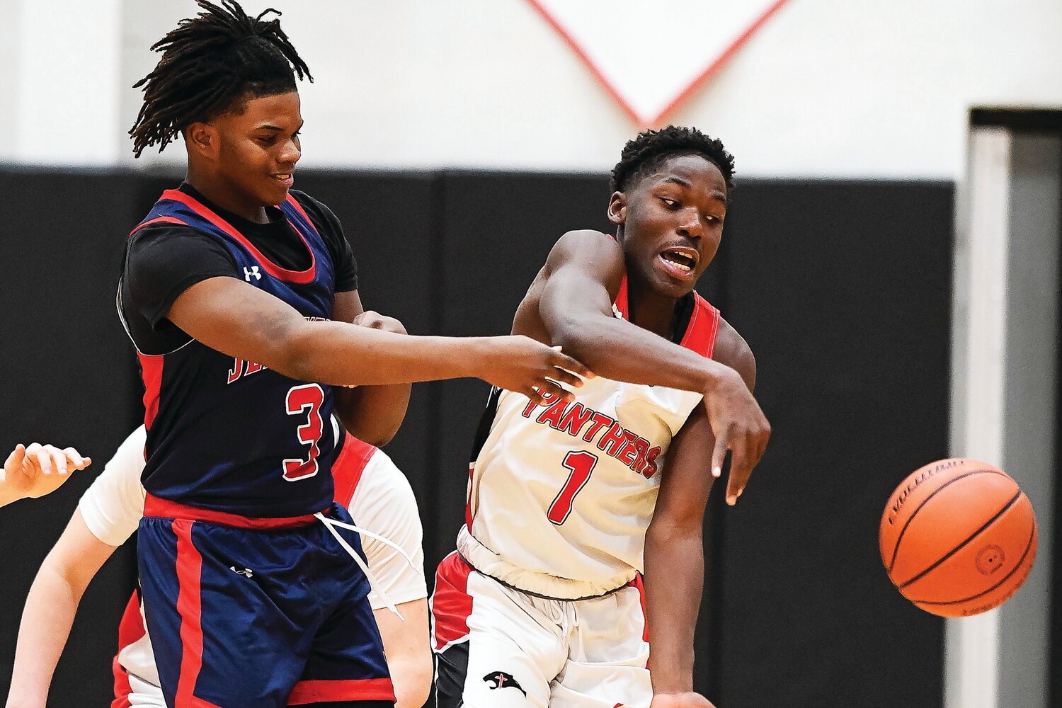 Plumstead Christian’s Phil Yallah gets off a pass in front of Jenkintown’s Desmond Trail.