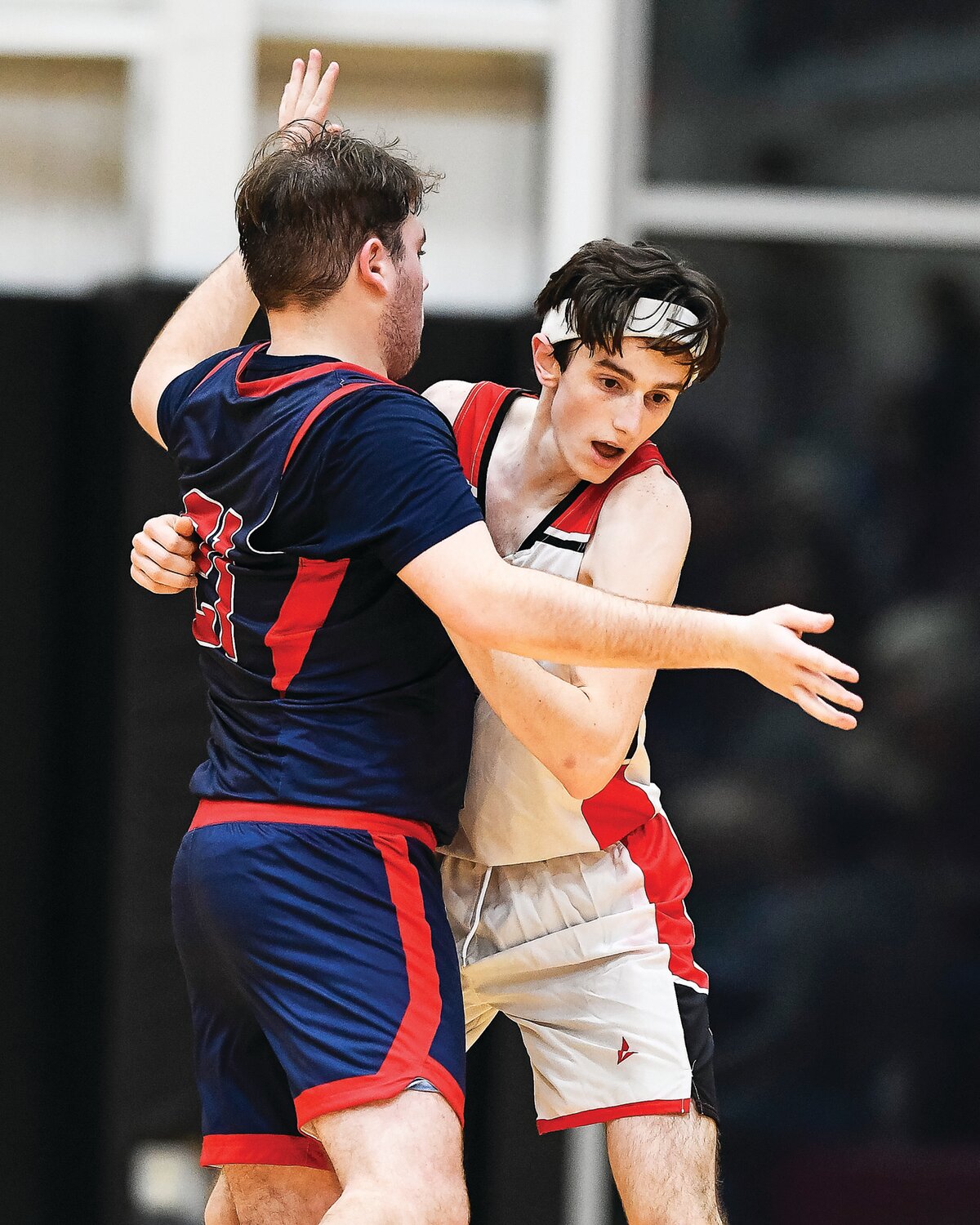 Plumstead Christian’s Jordan Eade and Jenkintown’s Tommy Walsh get tangled up during an inbound pass.
