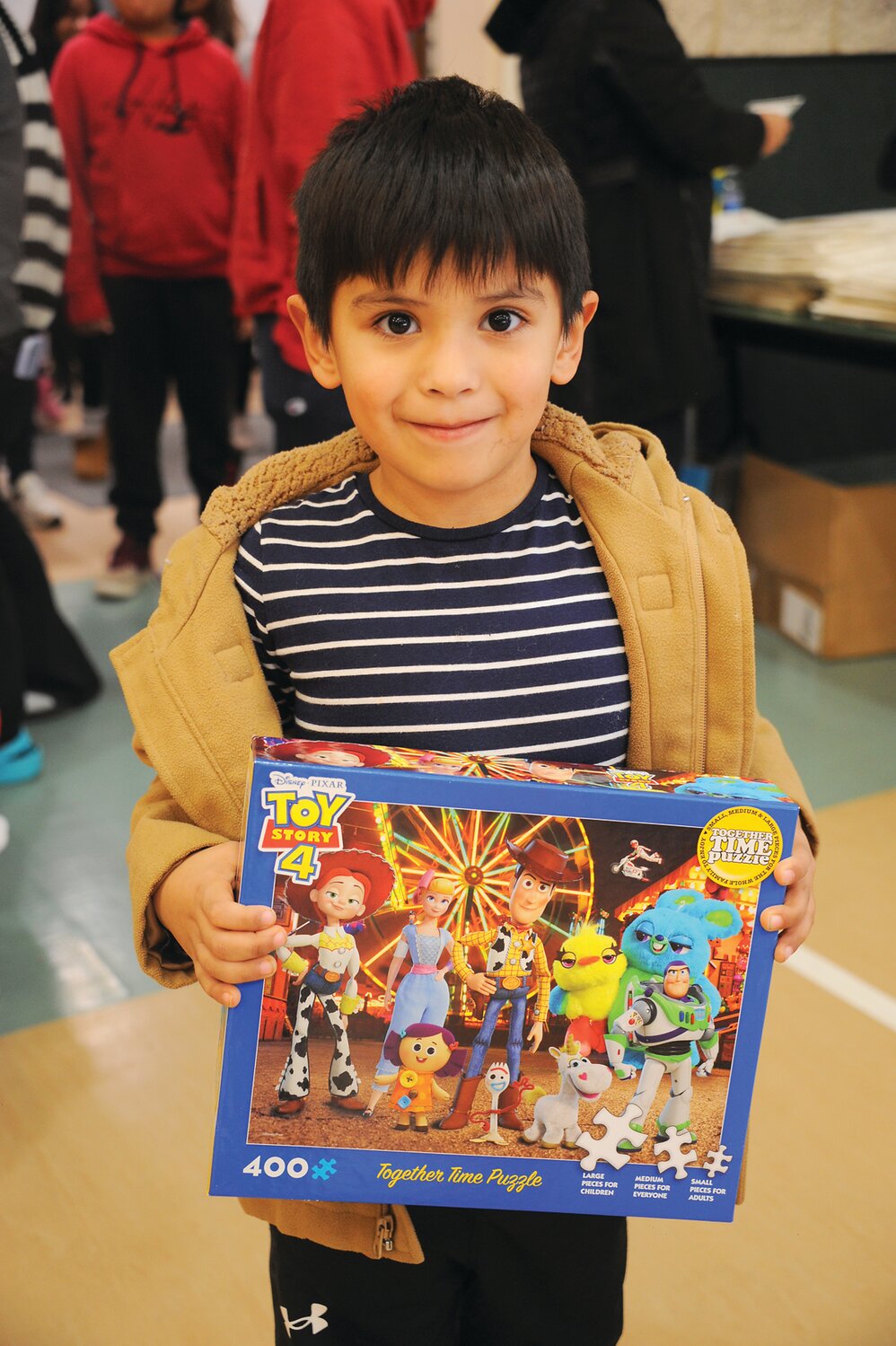 Diego holds a puzzle.