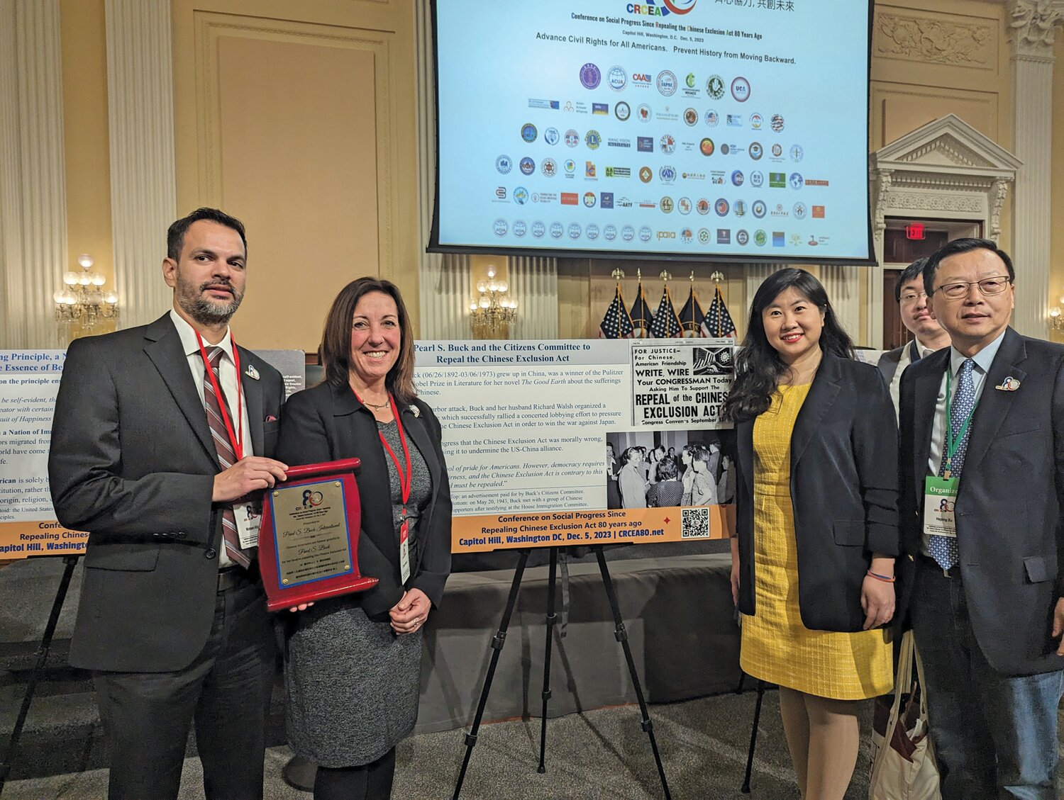 From left are: Pearl S. Buck International Board Chair Mateen Afzal, PSBI President and CEO Christy Holland, PSBI Board member Stephanie Sun, and CRCEA80 organizer Heping Xu.