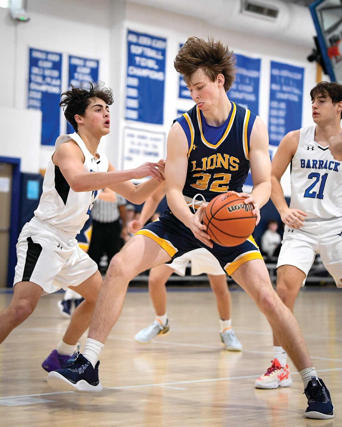 Liam Ross drives to the hoop during the first half.