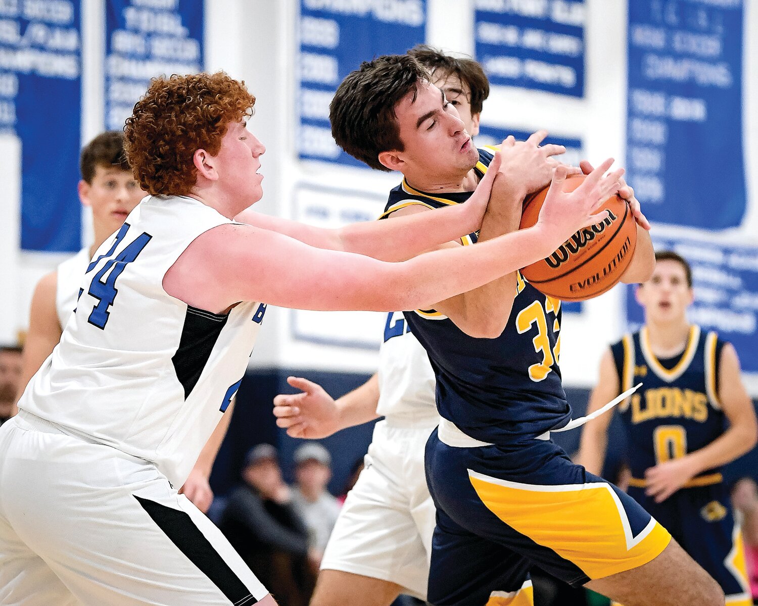Jack M. Barrack Hebrew Academy’s Jonah Thomas and New Hope-Solebury’s Dylan Fitzgerald scrap for a rebound during the first half.