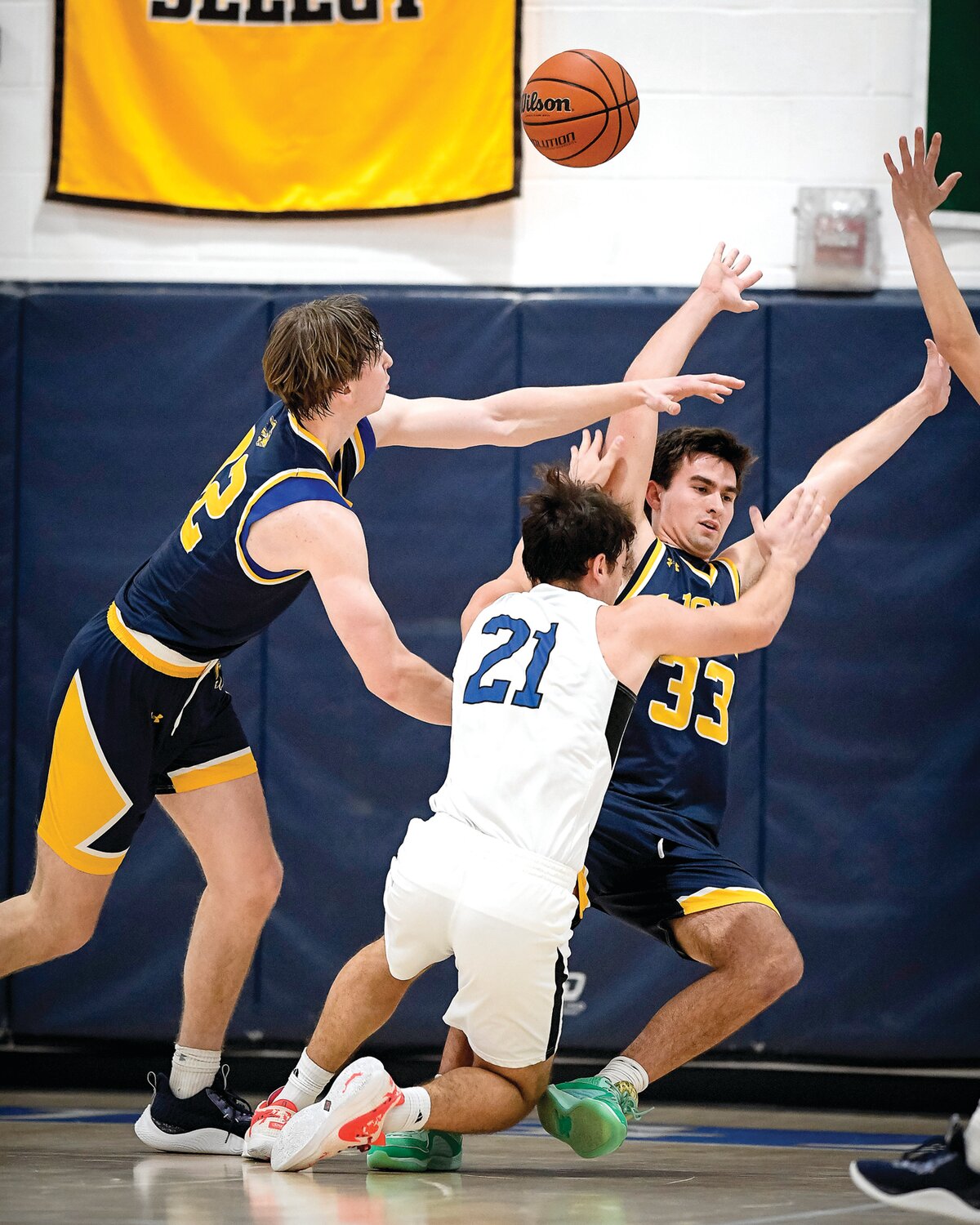 Jack M. Barrack Hebrew Academy’s Edo Aharoni gets double teamed as he crashes into a fallen New Hope-Solebury’s Dylan Fitzgerald.